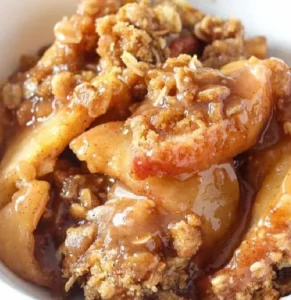 Delicious homemade apple crisp topped with a crunchy oat topping.