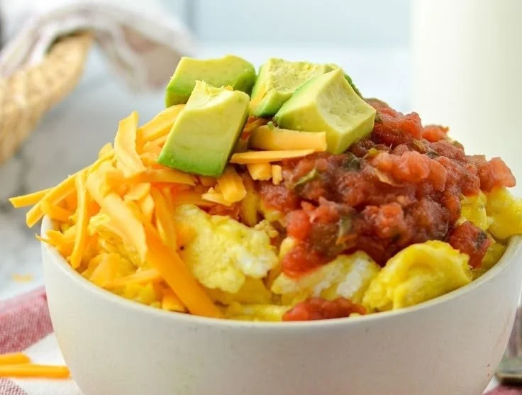 Delicious breakfast burrito bowl with toppings and ingredients