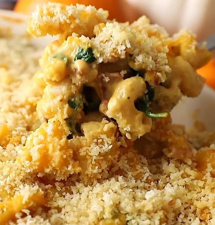 Creamy pumpkin mac and cheese dish served in a bowl