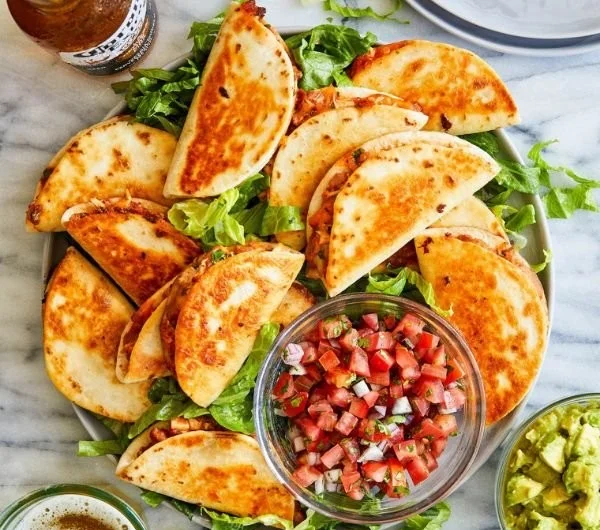 Delicious homemade chicken quesadillas with melted cheese and fresh ingredients