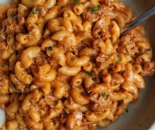 Delicious plant-based Hamburger Helper prepared in a skillet with vegetables.